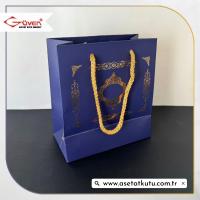 15.5x17x8 Lacivert Üzerine Gold Saray Desenli Karton Çanta